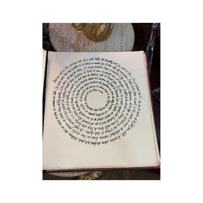 Página artística con texto manuscrito circular en francés de Petite Rapsodie de la Main