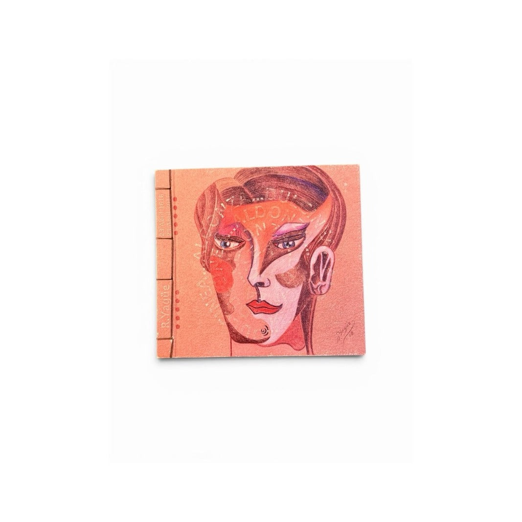 Cubierta rosa salmón del libro de artista con retrato cubista y encuadernación cosida