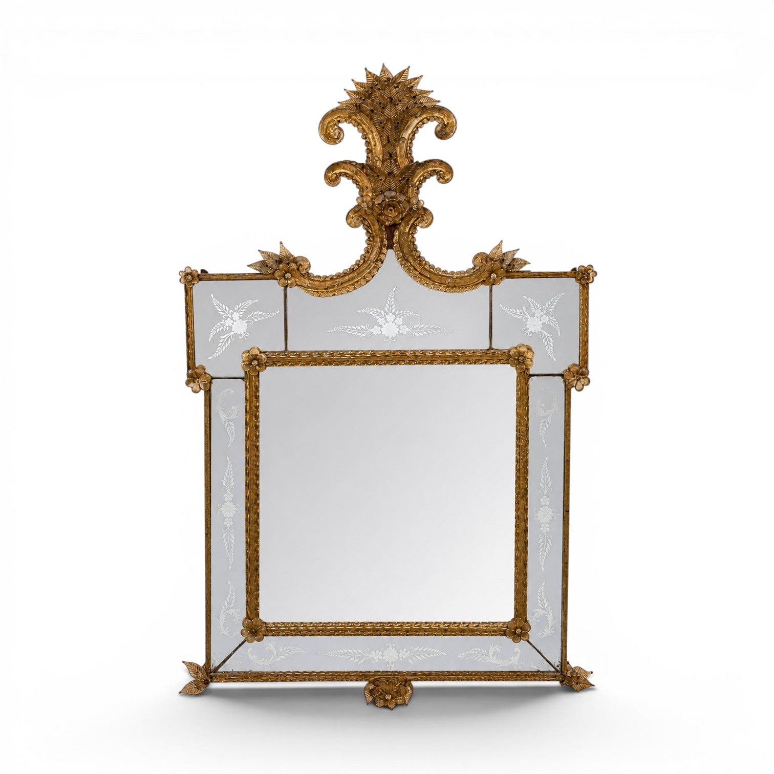 Vintage rectangular Venetian style wall mirror with etched panels and a floral crest made of yellow smoked glass.