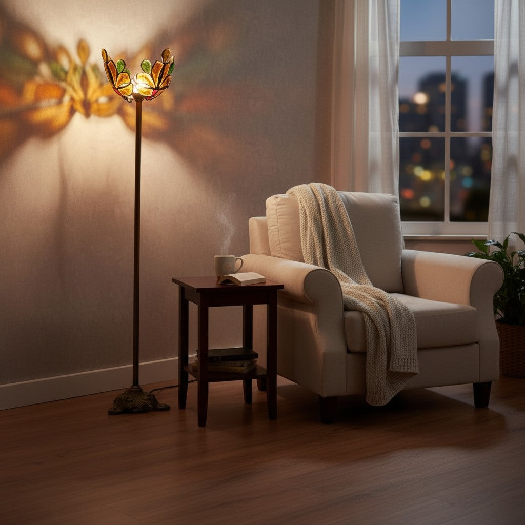 La Basilica Galeria Art Nouveau stained glass floor lamp with floral design and brass finish stem, casting warm light.