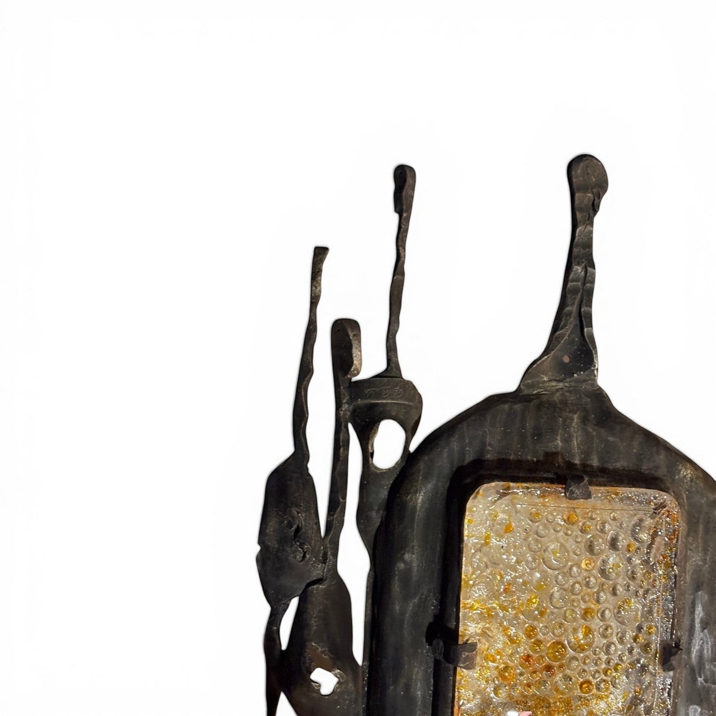 La Basilica Galeria Brutalist wall sconce with amber bubble glass and hand-welded oxidized metal.