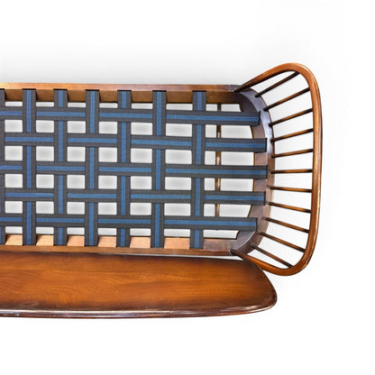 La Basilica Galeria vintage wooden bench with spindle back and blue webbing seat, ready for upholstery.