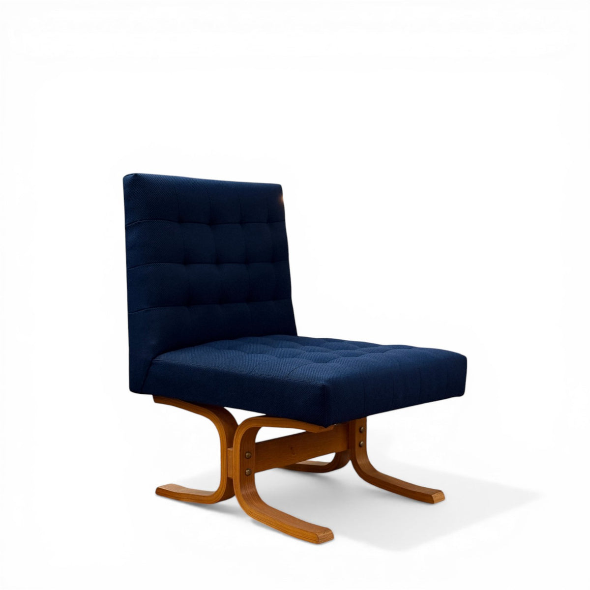 Mid-Century bentwood lounge chair by Ludvik Volak upholstered in blue tufted fabric front view